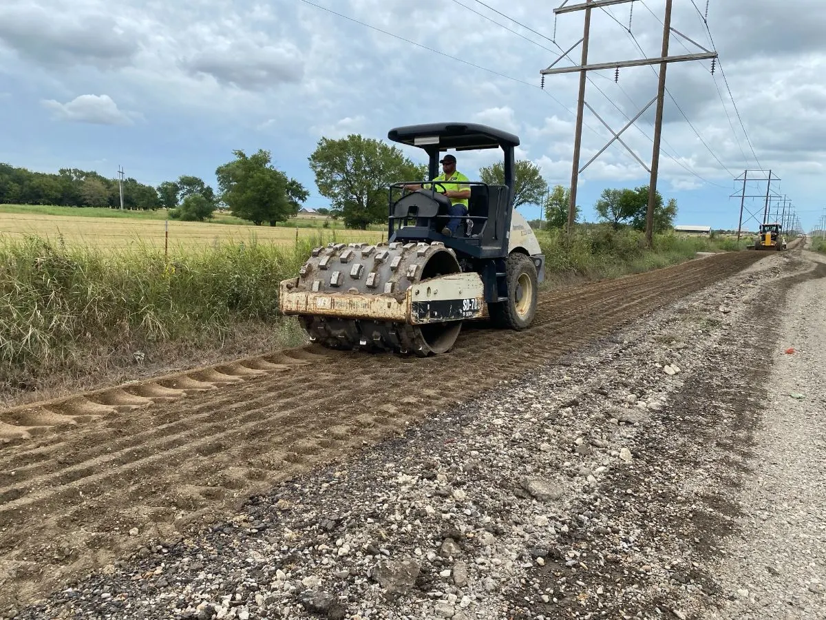 Padfoot roller compacting a treated road base